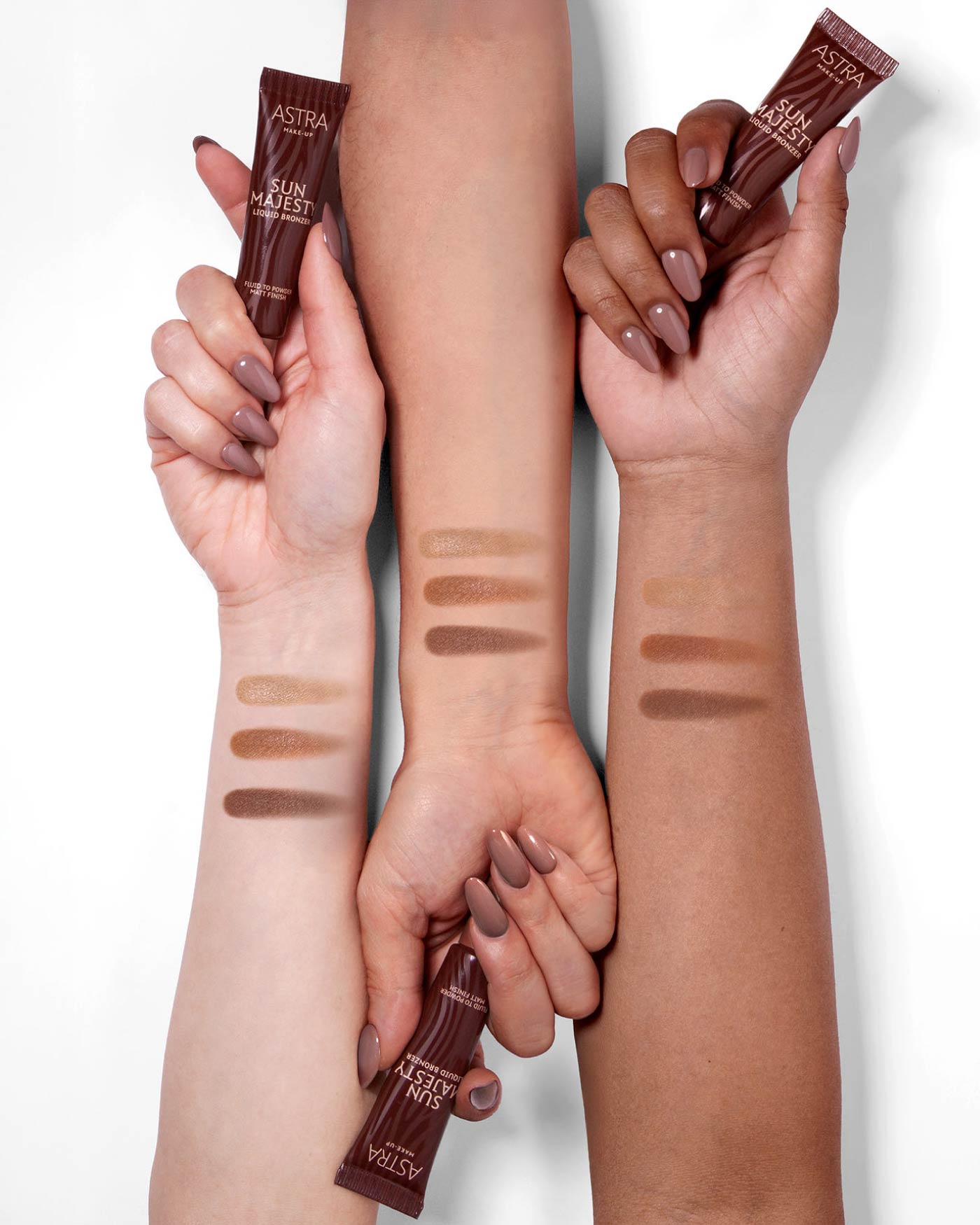 SUN MAJESTY LIQUID BRONZER - Polvos y Bronceadores - Astra Make-Up